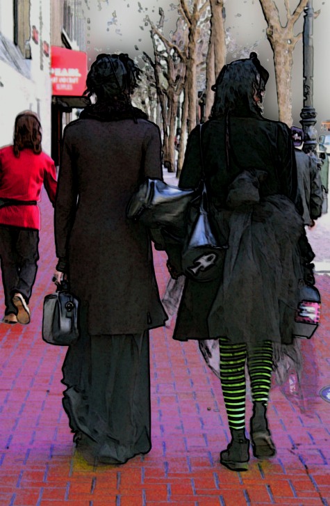 Couple dressed in goth black on Market Street in San Francisco