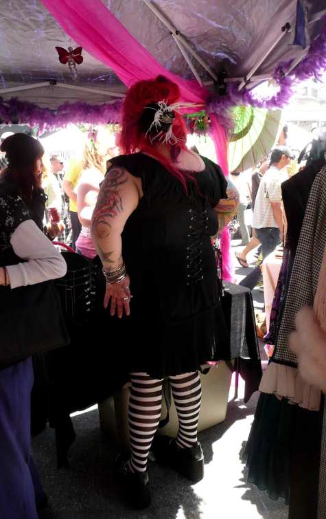 Bay-Area-Backsides-Sarah-Curtiss-Haight-Street-woman-black-dress-red-hair Large woman, black dress and corset, striped tights, high platforms, red hair