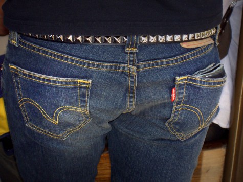 Bay-Area-Backsides-Sarah-Curtiss-Fisherman's-Wharf-Muni closeup of blue jeaned butt with metal belt