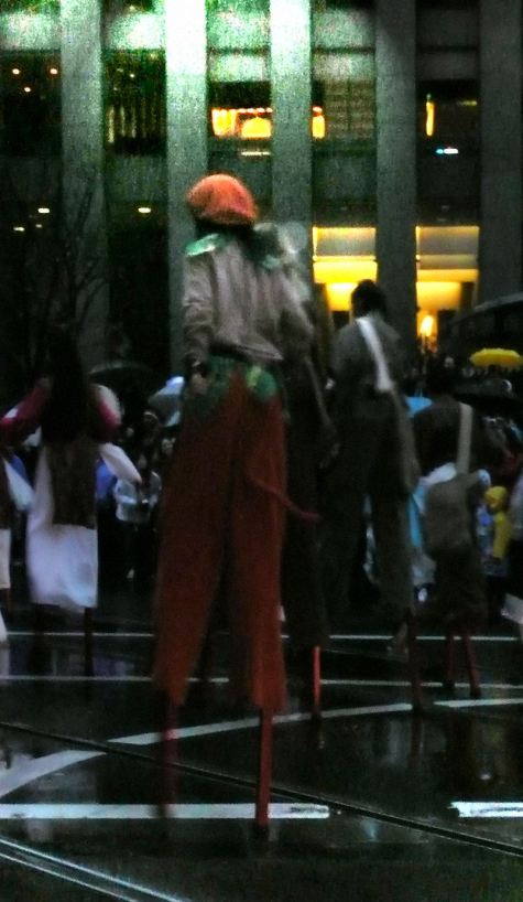 Boy on Stilts on Market Street, San Francisco, at Chinese New Year's Parade