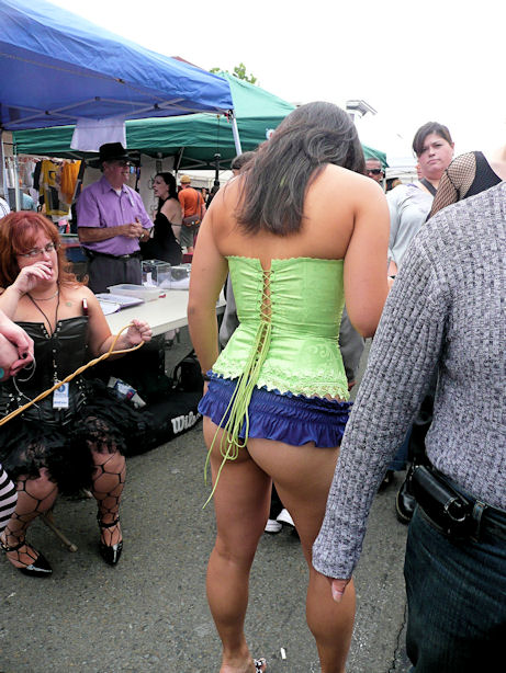 woman in green corset with purple thong